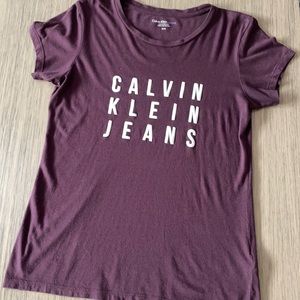 Cotton tee size medium in color purple